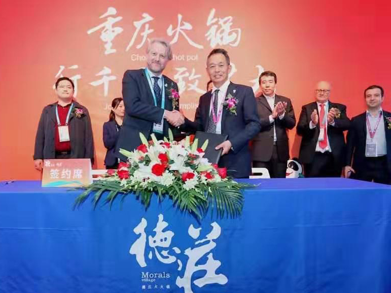 The Signature Ceremony between World Trade Point Federation and World Chilli Alliance and between Progetto CMR and World Chilli Alliance during the 2nd CIIE in Shanghai
